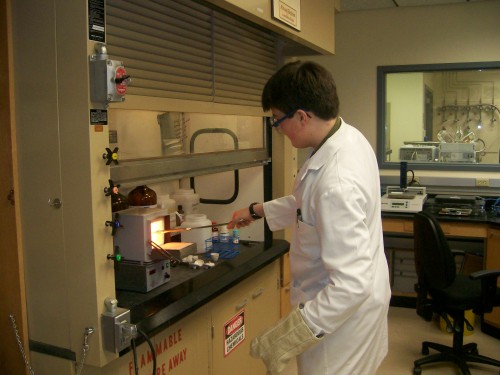 Michael using a muffler furnace. Photo © Sal Amato