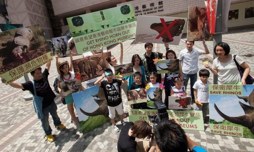 The protestors waved placards, chanted "save our rhinos" in English and Cantonese, and collected signatures for their petition. PHOTO: Alex Hofford